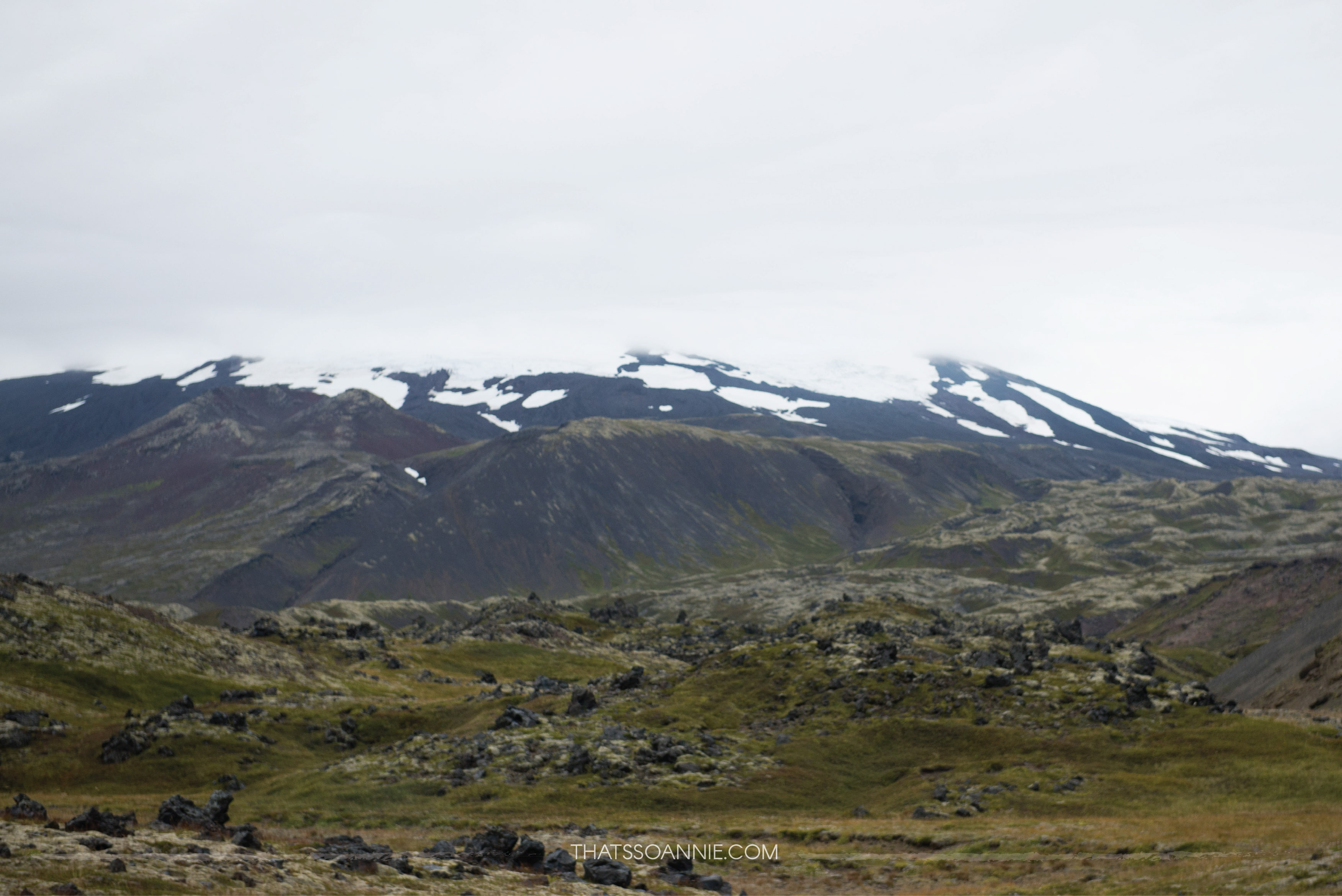 Snæfellsjökull surrounded by moss covered lava fields for miles on end | Exploring the Snæfellsnes Peninsula | Ring Road roadtrip, Iceland | www.thatssoannie.com